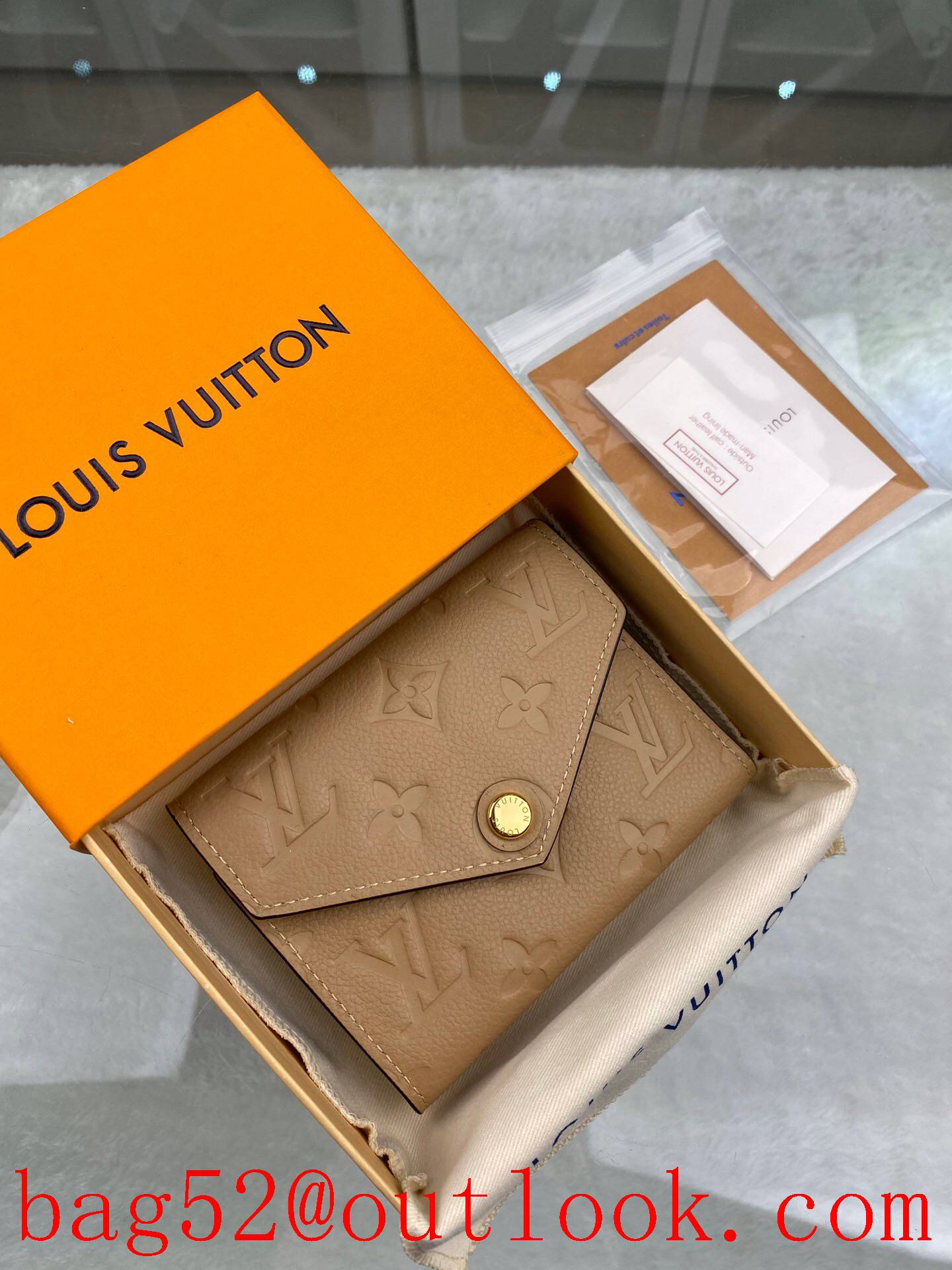 LV Louis Vuitton women apricot taurillon leather monogram wallet purse M62305