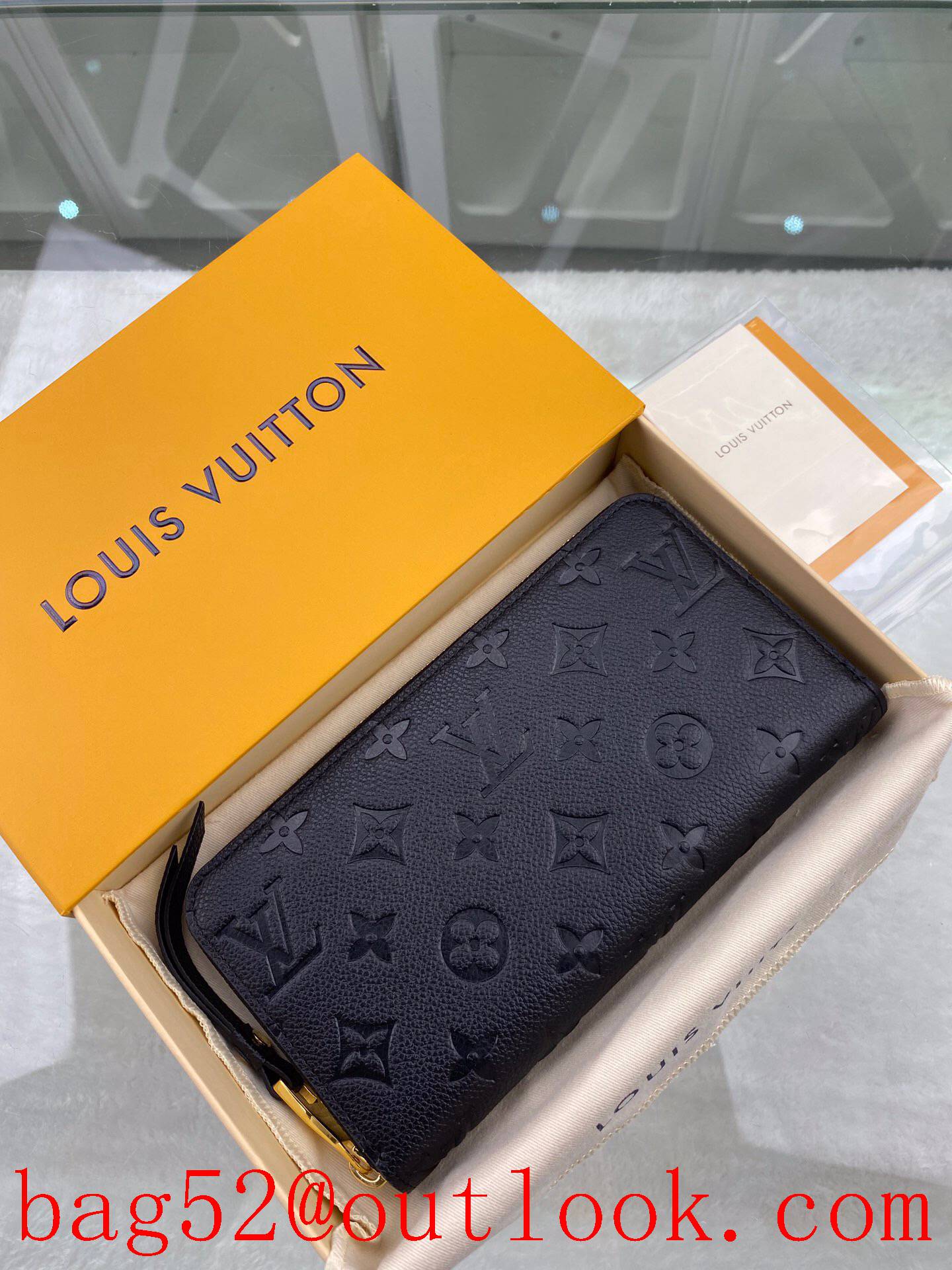 LV Louis Vuitton black long taurillon leather monogram empreinte zippy wallet purse M61864
