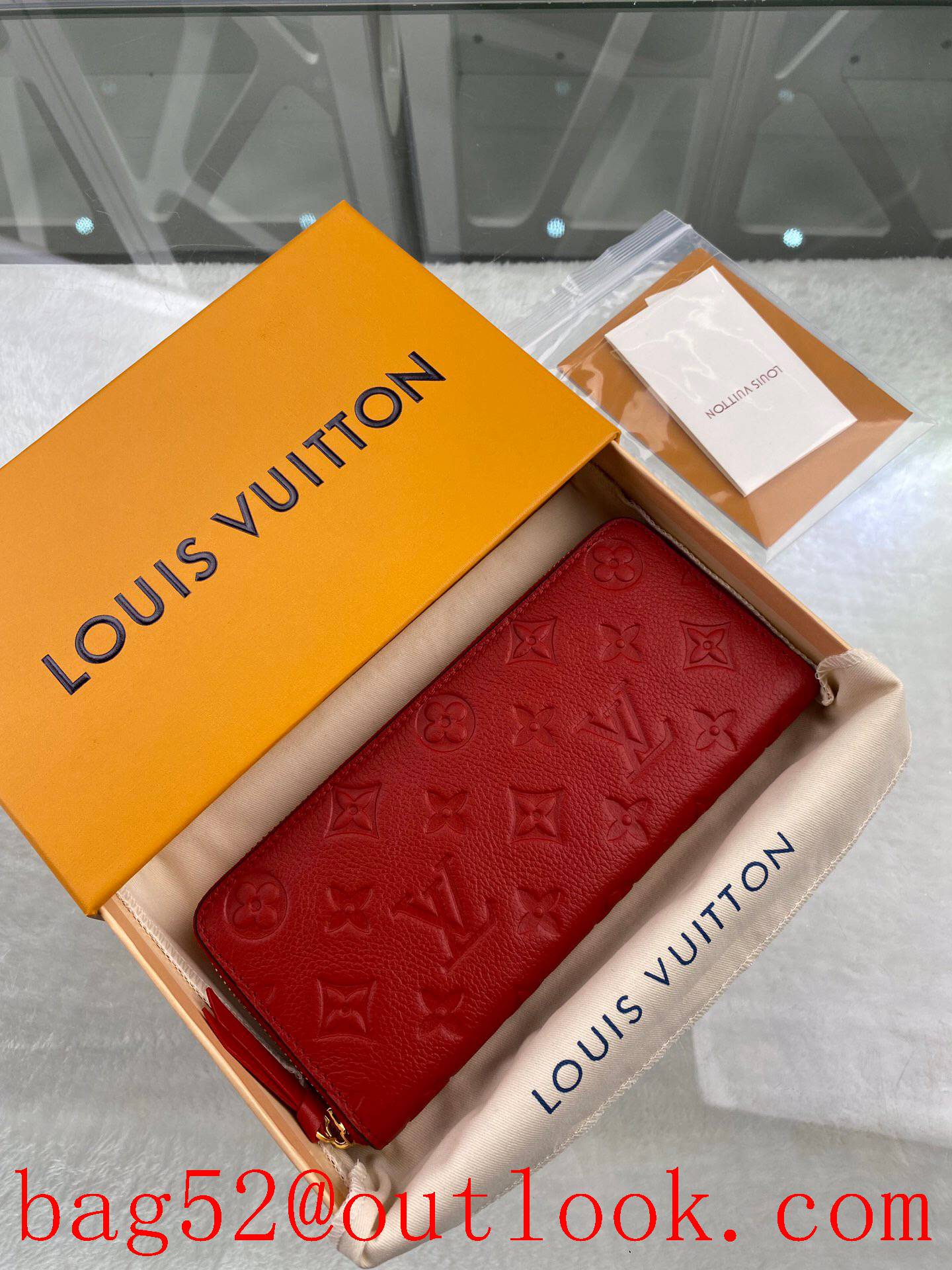 LV Louis Vuitton long red taurillon leather monogram zipper wallet purse M60169