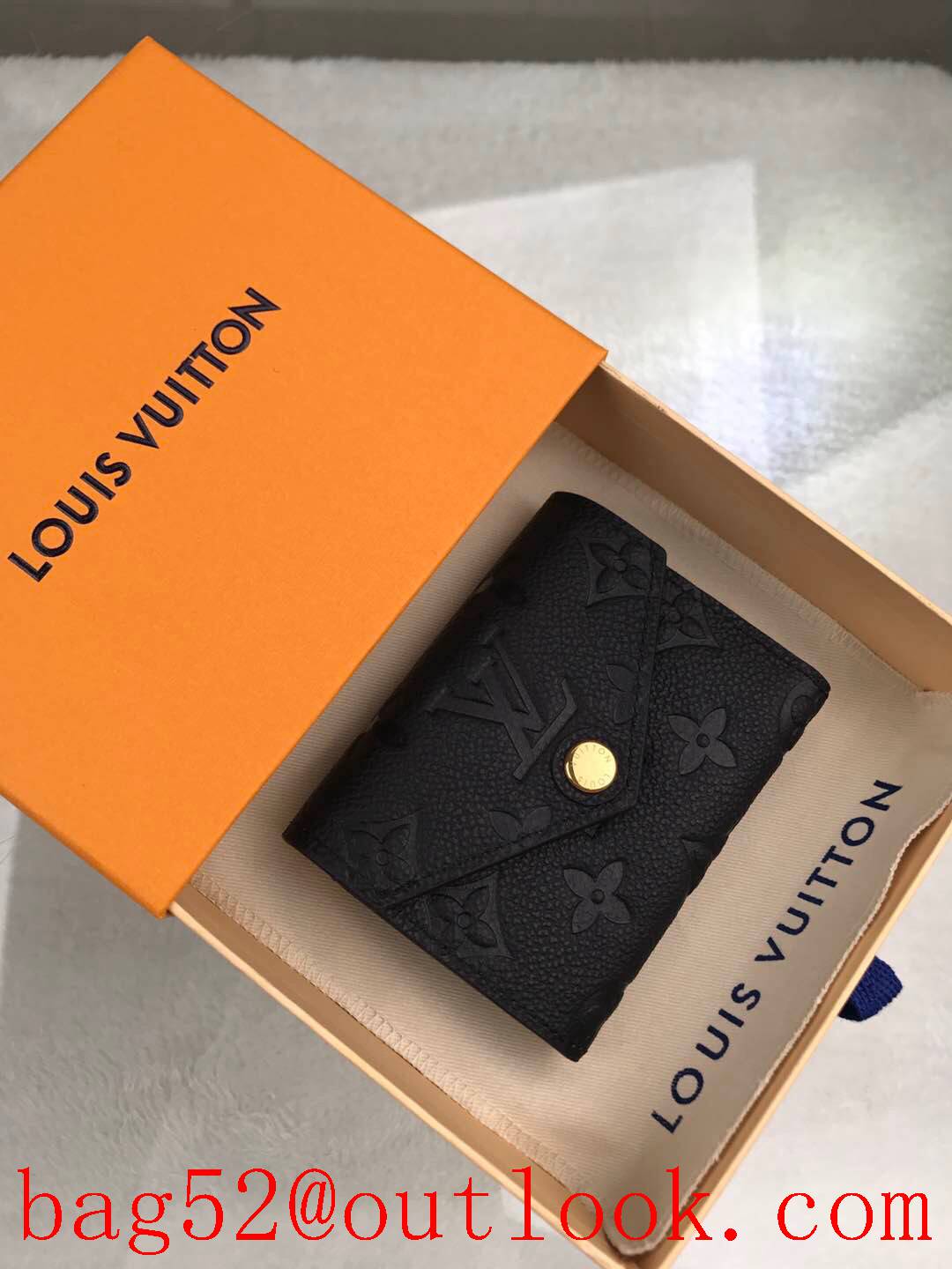 LV Louis Vuitton black taurillon leather monogram zoe flap wallet purse M62935