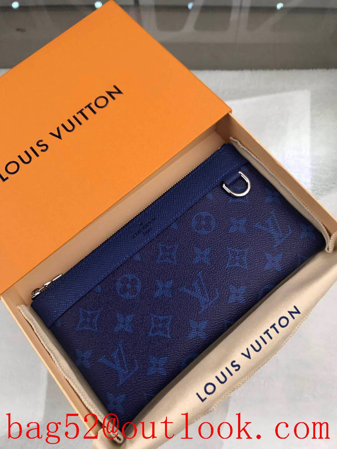 LV Louis Vuitton blue Discovery Pochette taurillon leather monogram wallet small clutch purse M30278