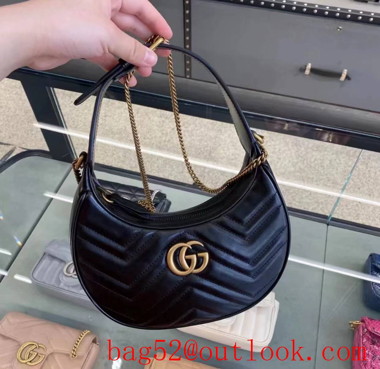 Gucci GG Marmont underarm black half-moon handbag