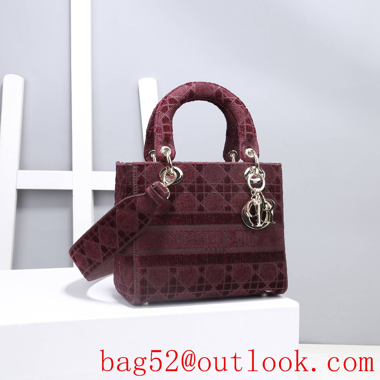 Dior Five panels of burgundy velvet embroidered cannage pattern throughout winered tote bag