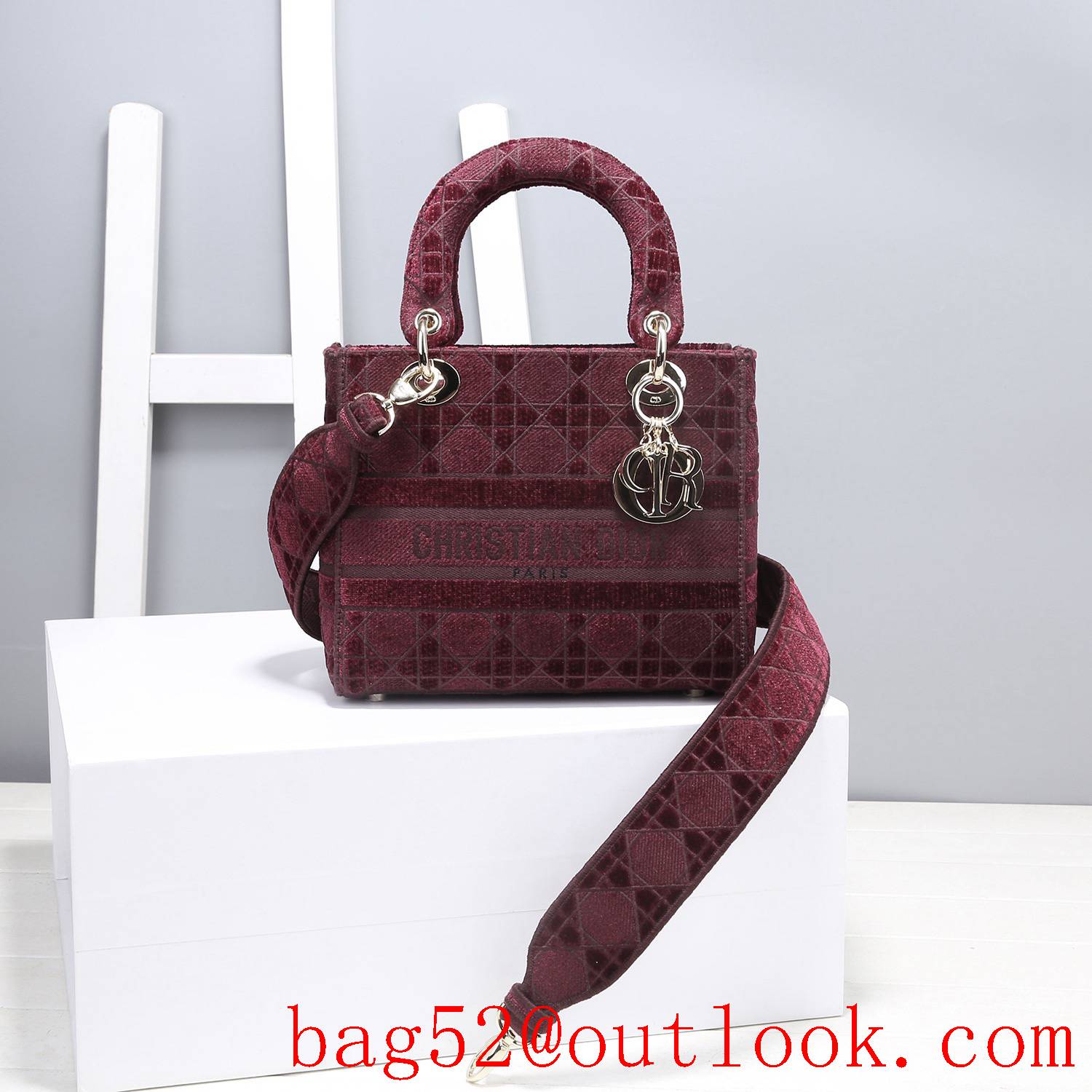 Dior Five panels of burgundy velvet embroidered cannage pattern throughout winered tote bag