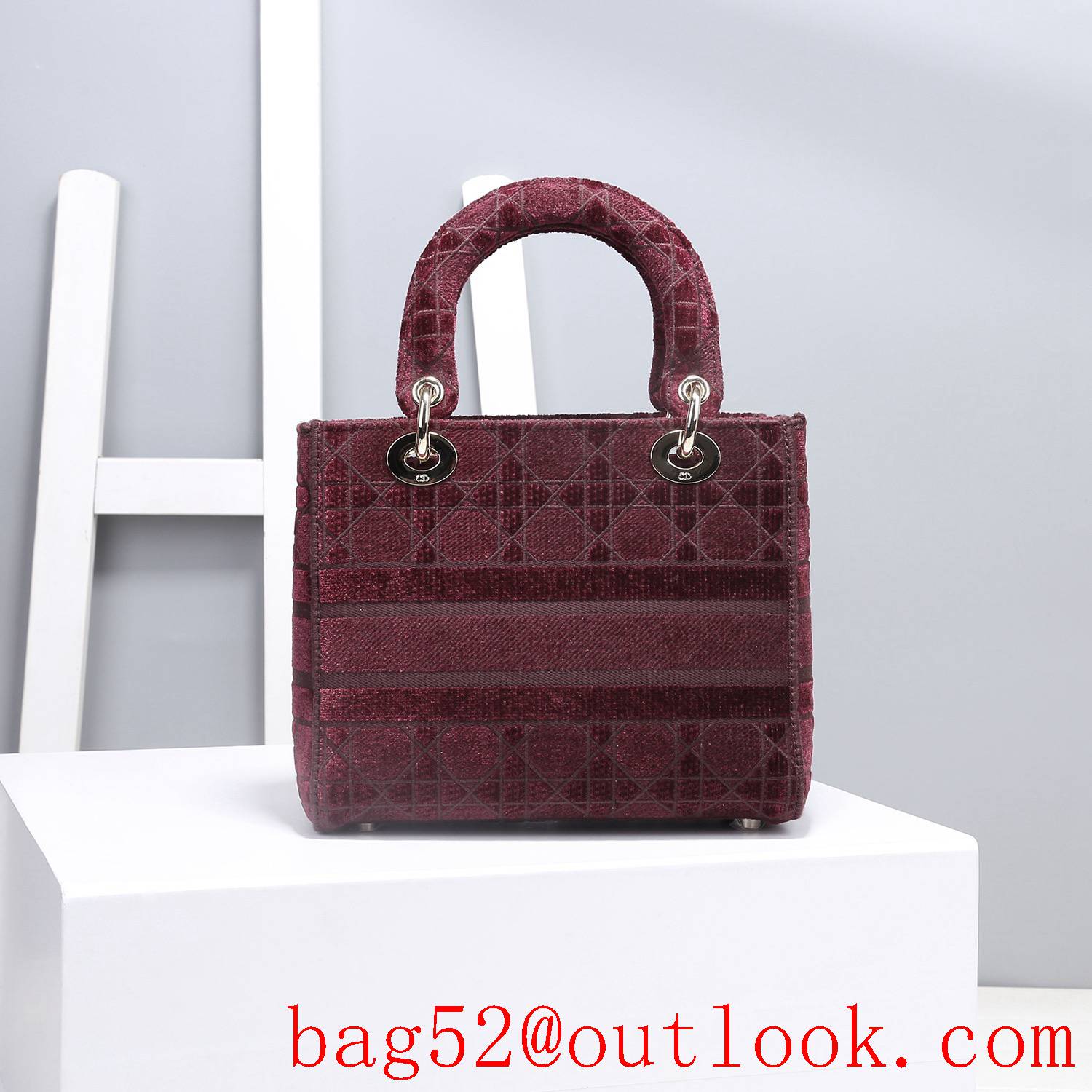 Dior Five panels of burgundy velvet embroidered cannage pattern throughout winered tote bag