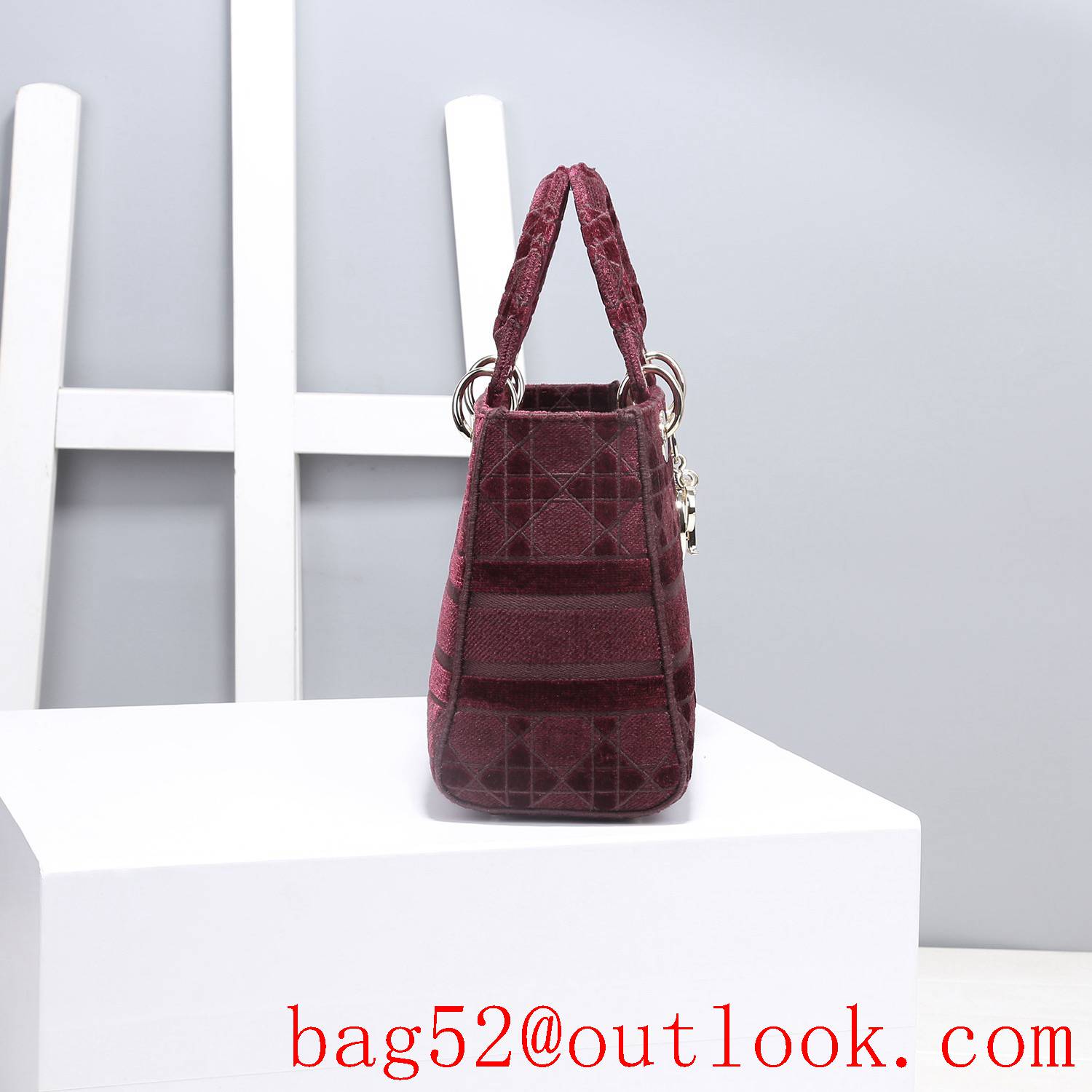 Dior Five panels of burgundy velvet embroidered cannage pattern throughout winered tote bag