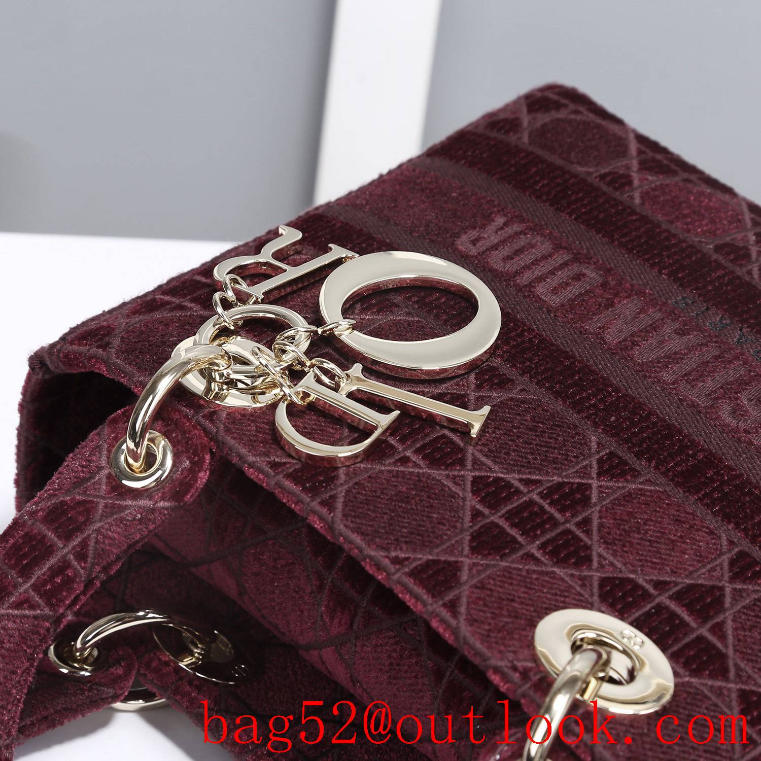 Dior Five panels of burgundy velvet embroidered cannage pattern throughout winered tote bag