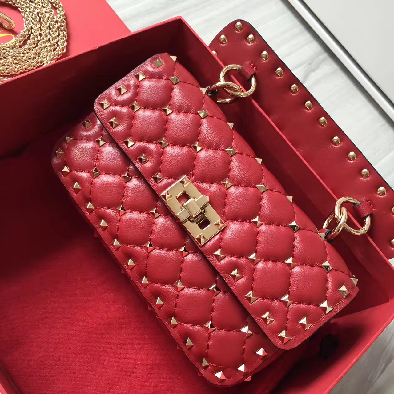 valentino small red rockstud handbags